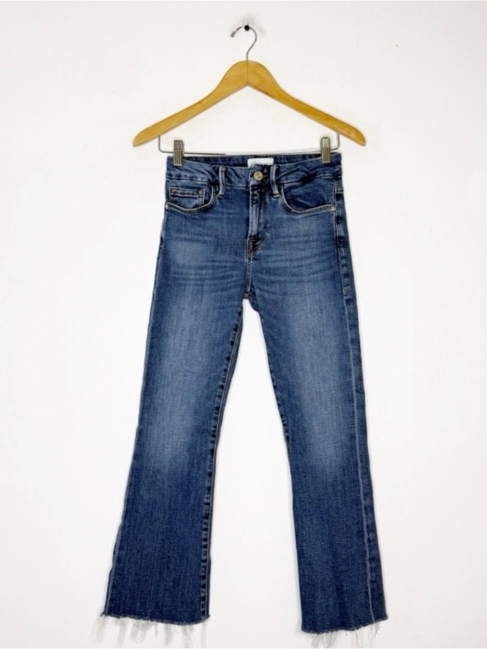 Frame Denim Blue Flared Jeans with Raw Hem